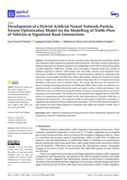 Development of a hybrid artificial neural network-particle swarm optimization model for the modelling of traffic flow of vehicles at signalized road intersections