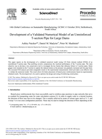 Development of a validated numerical model of an unreinforced T-section pipe for large dams