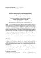 Behavior of eccentrically inclined loaded footing resting on fiber reinforced soil