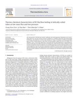 Thermo-chemical characteristics of R134a flow boiling in helically coiled tubes at low mass flux and low pressure
