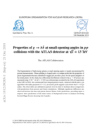 Properties of g → b b¯  at small opening angles in pp collisions with the ATLAS detector at √s = 13 TeV