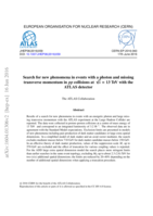 Search for new phenomena in events with a photon and missing transverse momentum in pp collisions  at √s = 13 TeV with the ATLAS detector