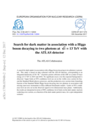 Search for dark matter in association with a Higgs boson decaying to two photons at √s = 13 TeV wit b h the ATLAS detector