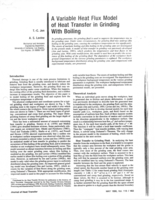 A variable heat flux model of heat transfer in grinding : model development