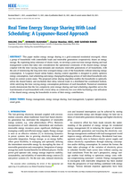 Real time energy storage sharing with load scheduling : a lyapunov-based approach