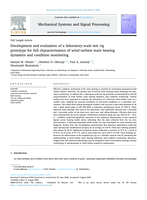 Development and evaluation of a laboratory-scale test rig prototype for full characterization of wind turbine main bearing dynamics and condition monitoring