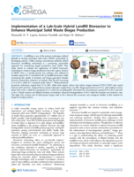 Implementation of a lab-scale hybrid landfill bioreactor to enhance municipal solid waste biogas production