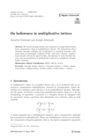 On hollowness in multiplicative lattices